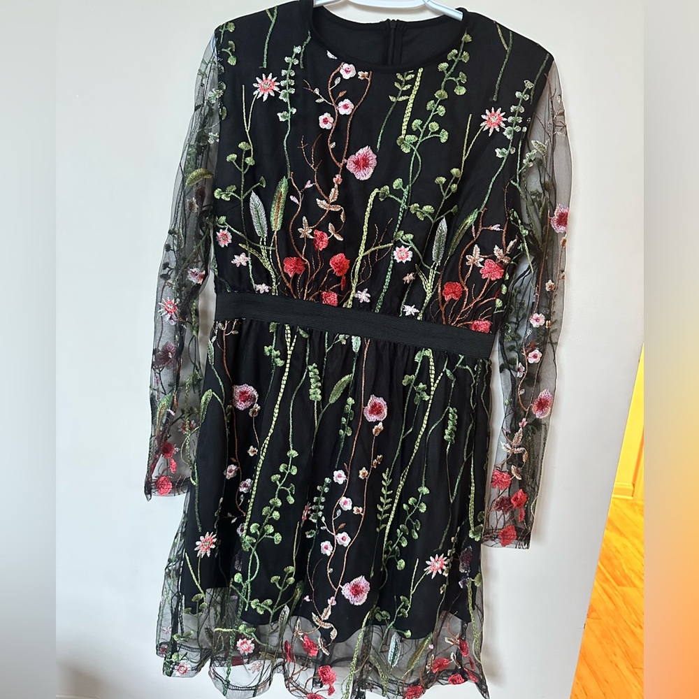 Hand stitched and embroidered black dress
